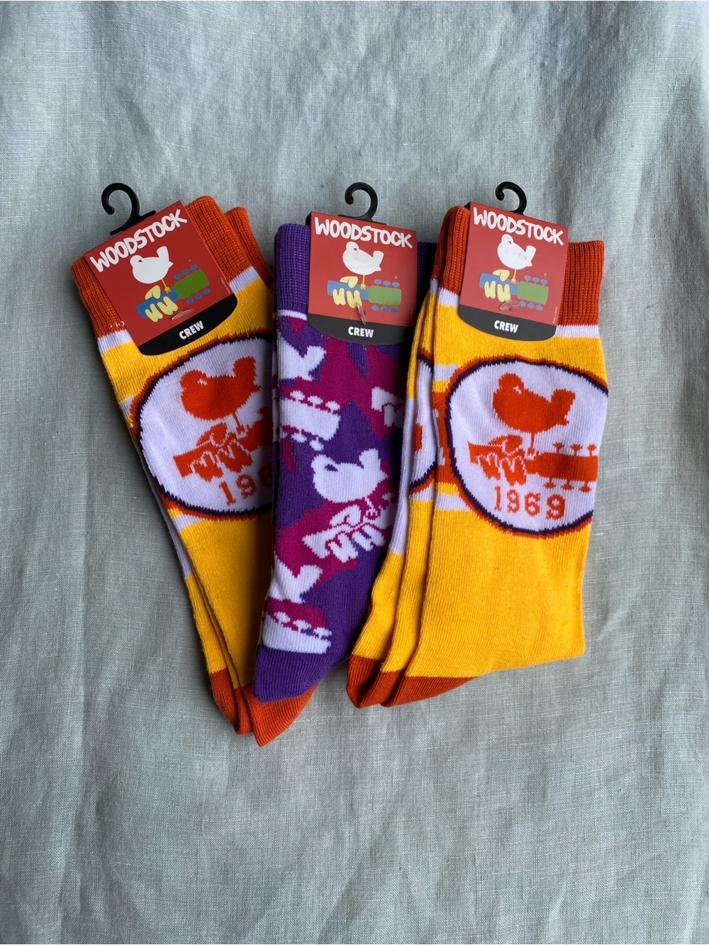 Lot of 3 NWT Bioworld Woodstock crew socks yellow purple size 10-13